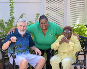 DayAway clients and staff enjoy time outside in the therapeutic garden